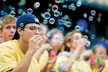 Students blowing bubbles